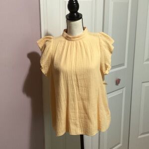 Chic Ruffled Blouse in Soft Yellow